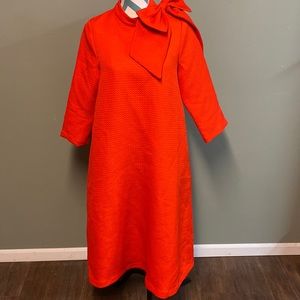Woman's size medium orange Dainty Jewells  dress with big bow and zipper in back